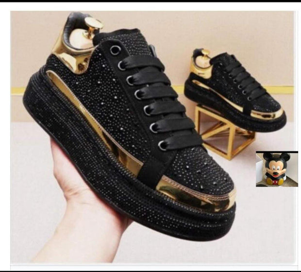 Alexander McQueen gold design